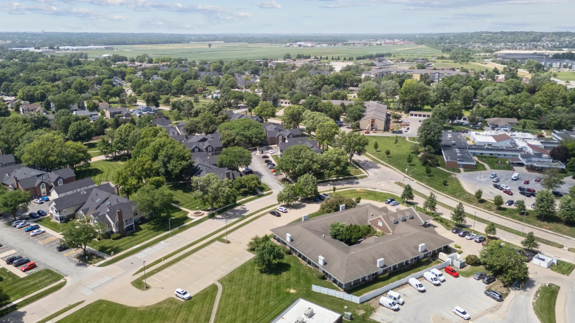 Wide aerial view across central Iowa from above the facility